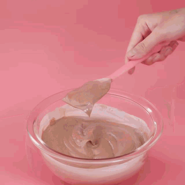 a close up of a cake being poured with liquid