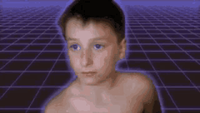 a young boy without a shirt is standing in front of a purple background .