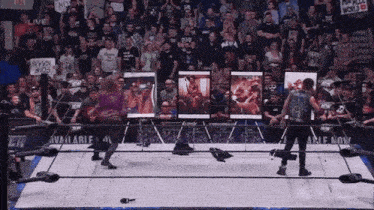 a wrestling ring with a banner that says available