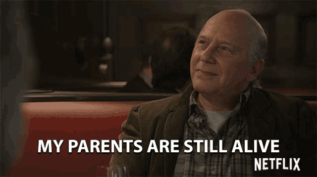 an advertisement for netflix shows an older man sitting at a table
