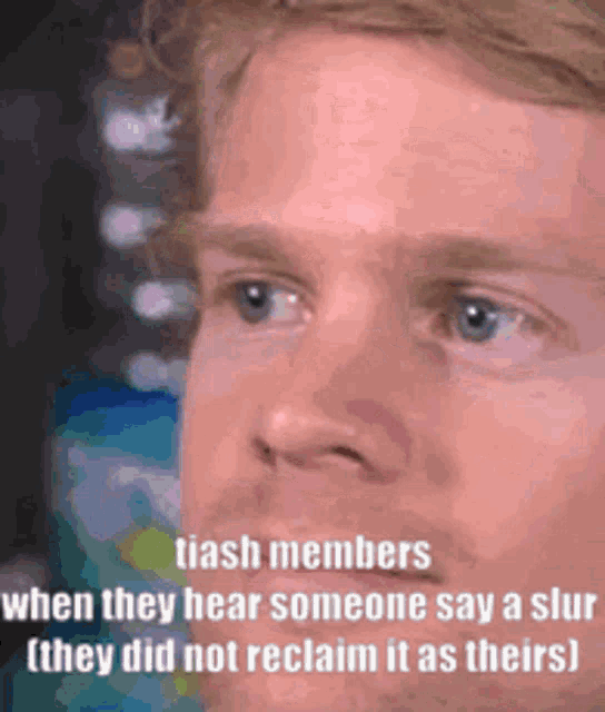 a close up of a man 's face with a caption that says ' tiash members ' on it