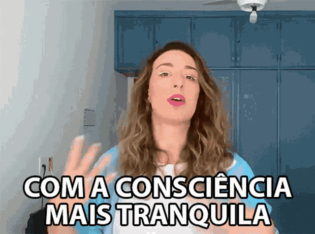 a woman says " com a consciencia mais tranquila " in a foreign language