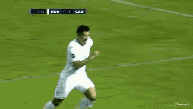 a soccer game is being played between hon and can and the score is 1-0