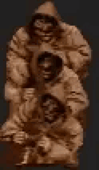 a group of people with hoods on their heads are stacked on top of each other .