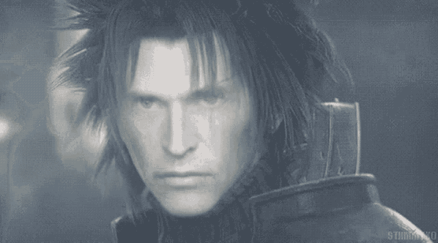 a close up of a man 's face in a video game with a serious look on his face .