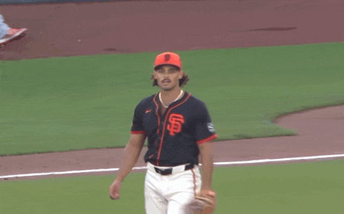 a baseball player with a mustache wears a sf jersey