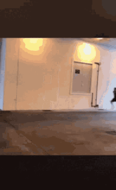a white wall with a sign on it that says ' no smoking '