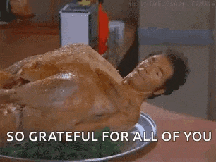 a man is laying on a plate of food with the words `` so grateful for all of you '' written below him .
