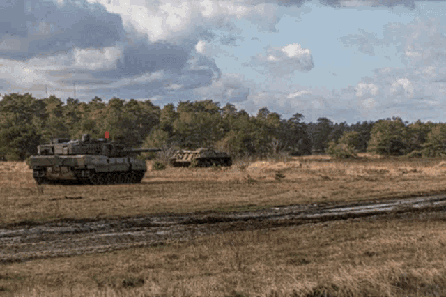 a military vehicle with a red light on top of it