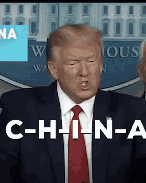 a man in a suit and tie says c-h-in-a
