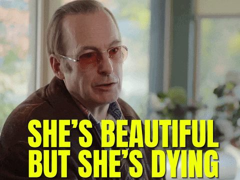 a man says she 's beautiful but she 's dying while wearing glasses