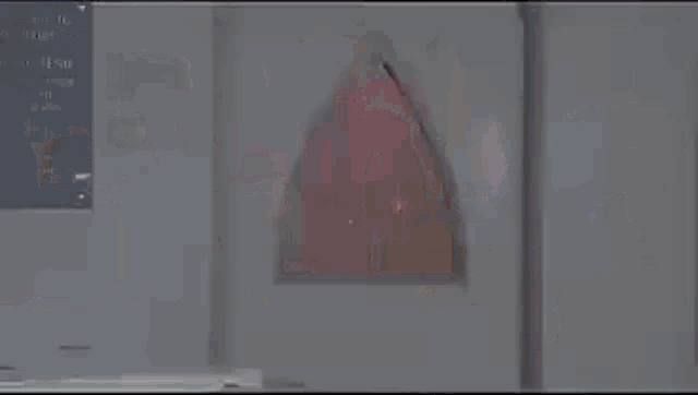 a man in a red suit is dancing in a room with the words e o aras hein written on the bottom