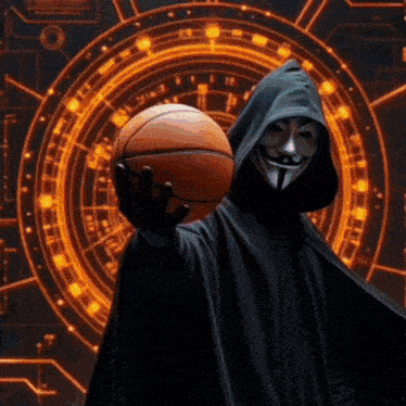 a man in a hooded cape holds a basketball in his hand