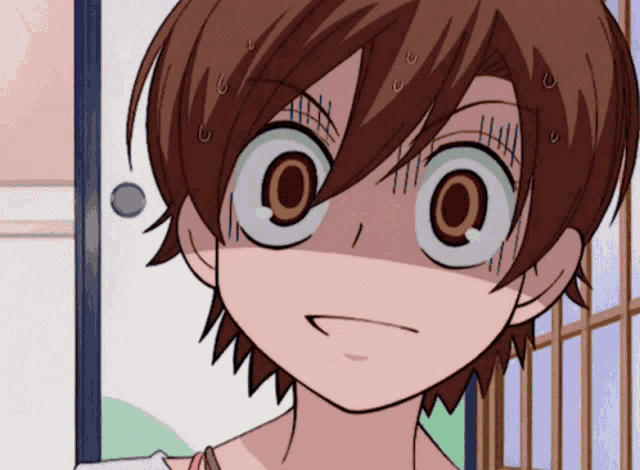 a close up of a cartoon character 's face with a surprised look on her face