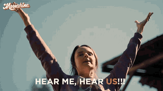 a woman with her arms in the air with the words hear me hear us below her