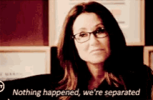 a woman wearing glasses says nothing happened we are separated
