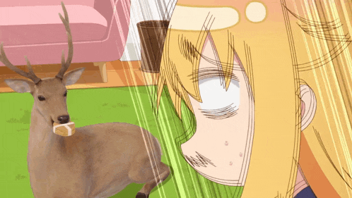 a girl with a bandage on her head looks at a deer with a cookie in its mouth