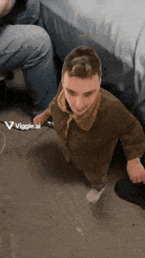 a picture of a man with the word viggle.ai on the bottom left