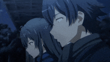 a boy and a girl are standing next to each other and looking at something