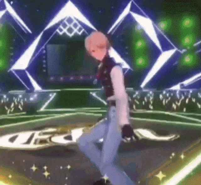 a person is dancing on a stage in front of a crowd of people .