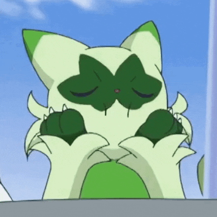 a green cartoon cat with a green bow on its head is sitting down with its eyes closed .