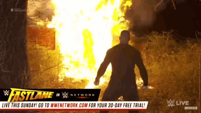 a man standing in front of a fire with the words fastlane on the top