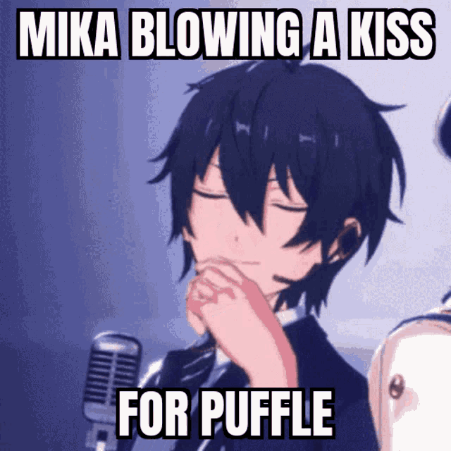 a picture of a person blowing a kiss with a caption that says mika blowing a kiss for puffle