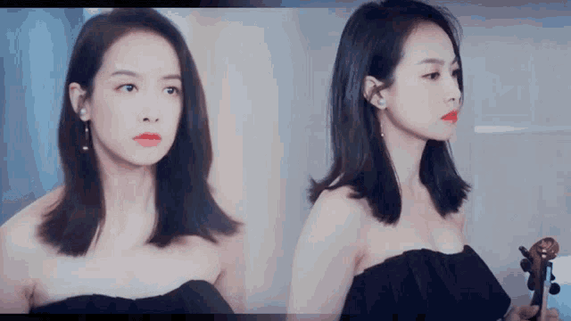 a woman in a black dress is holding a violin and looking at the camera .