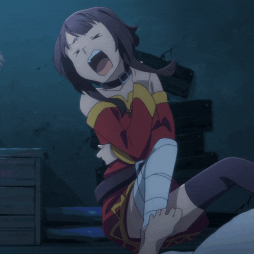 a girl with a bandage on her leg is sitting down