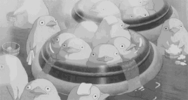 a black and white cartoon of a group of birds sitting on top of a circular object .