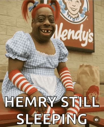 a wendy 's sign with a person dressed as wendy