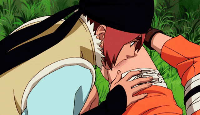 a couple of anime characters are kissing each other