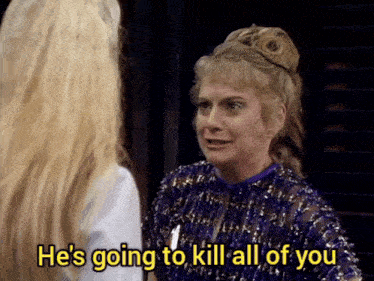 a woman says he 's going to kill all of you while talking to another woman
