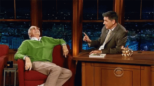 Laughing Stan Lee GIF - Laughing Stan Lee And GIFs