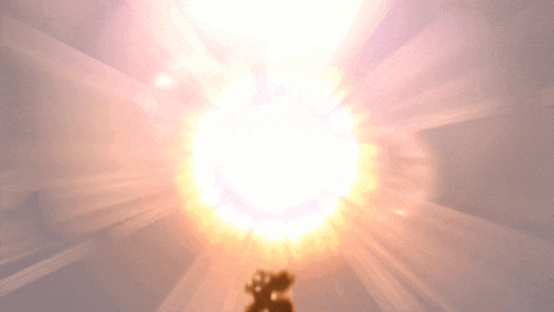 a person is standing in front of a large sun