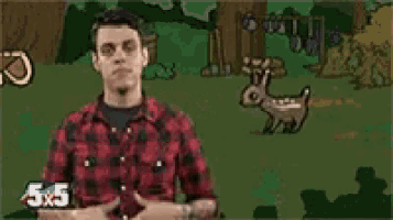 a man in a plaid shirt is standing in front of a cartoon scene with the number 5x5 on his shirt