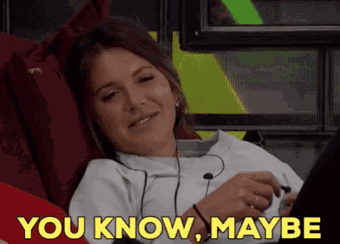 a woman laying on a couch with the words " you know maybe " on the screen