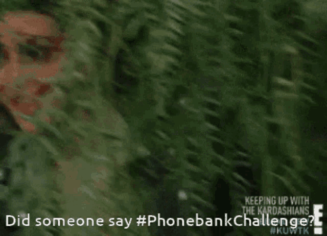 a gif of kim kardashian with the words " did someone say #phonebank challenge "