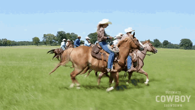 a group of people riding horses in a field with the words ultimate cowboy showdown