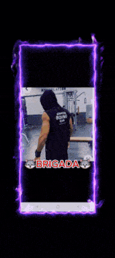 a phone screen shows a picture of a boy and a girl and the words brigada on the bottom