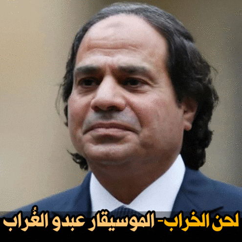 a close up of a man 's face with arabic writing above him