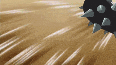 a black object with spikes on it is moving in the air