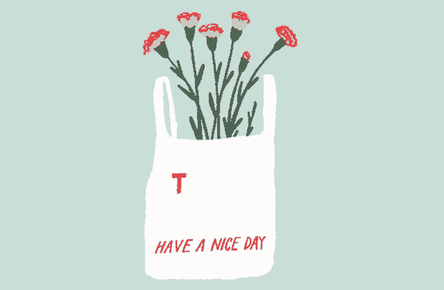 a thank you bag with red flowers in it