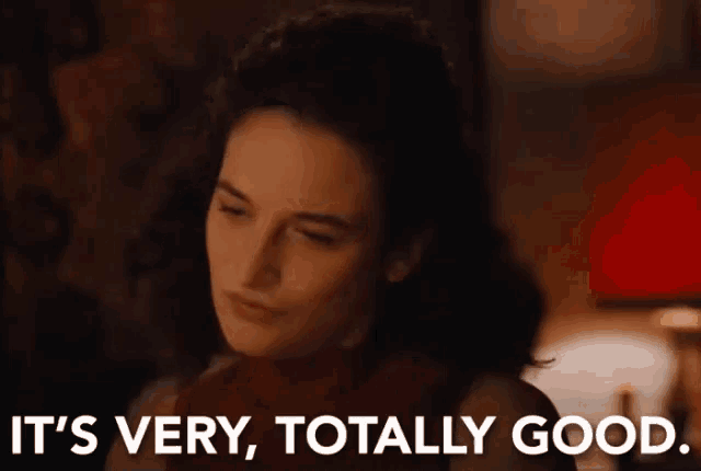 a woman is sitting in a chair with her eyes closed and says it 's very , totally good .