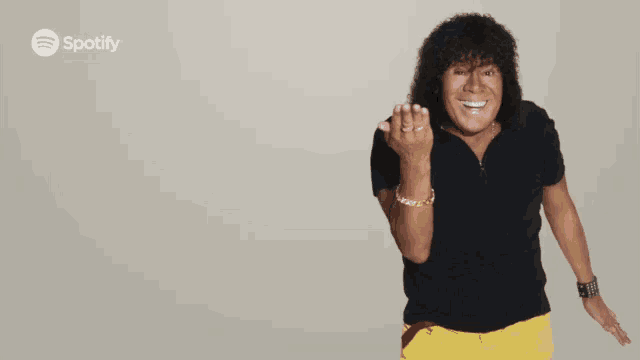 a spotify ad with a man in yellow shorts