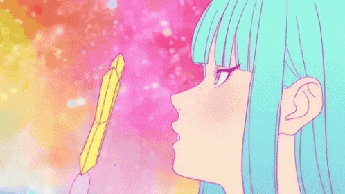 a girl is standing in front of a colorful sky with a rainbow in the background .
