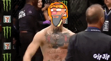 a man with a tattoo on his chest is standing next to a man with a mask on his head .