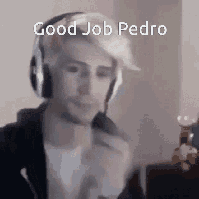 a man wearing headphones is talking into a microphone and says good job pedro