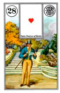 a man in a top hat is standing in front of a staircase holding a letter .