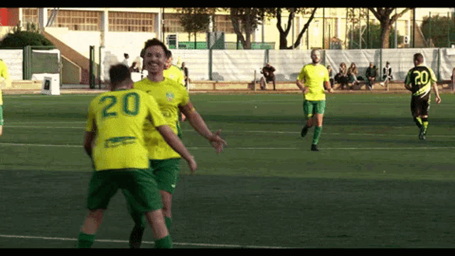 a soccer player with the number 20 on his back